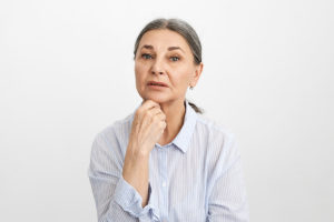 woman thinking - learn about lung cancer facts