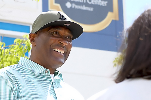 Wade Stevenson helps Elridge Cavitt