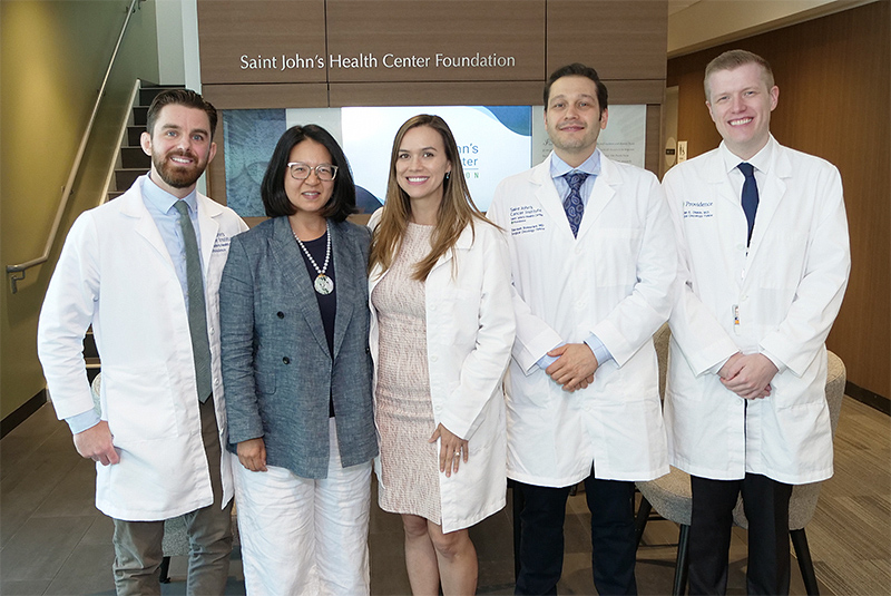 Dr. Vivian Wu with DLM fellow graduates