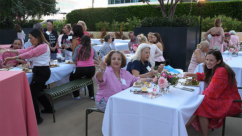 Guests gather and mingle at Saint John's Goes Pink