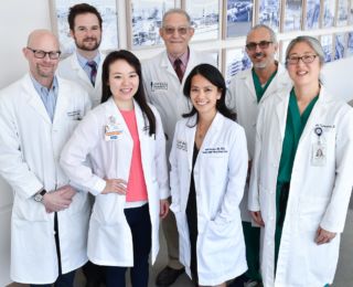 Group photo of doctors from the breast center team