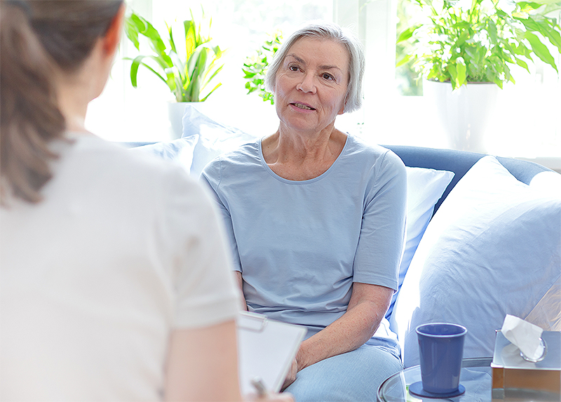 Nurse reviewing risk factors with patient