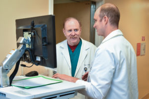 Doctors discussing risks
