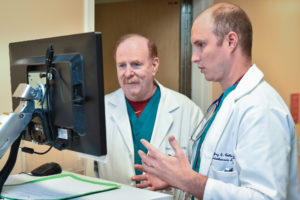 Doctors going over results