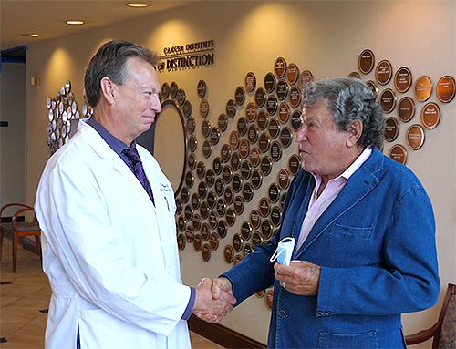 Dr. Wilson Congratulates his Patient