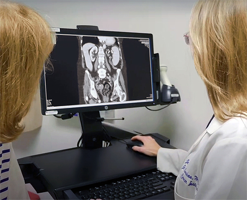 Dr. Jennifer Linehan discusses treatment options with a urology patient