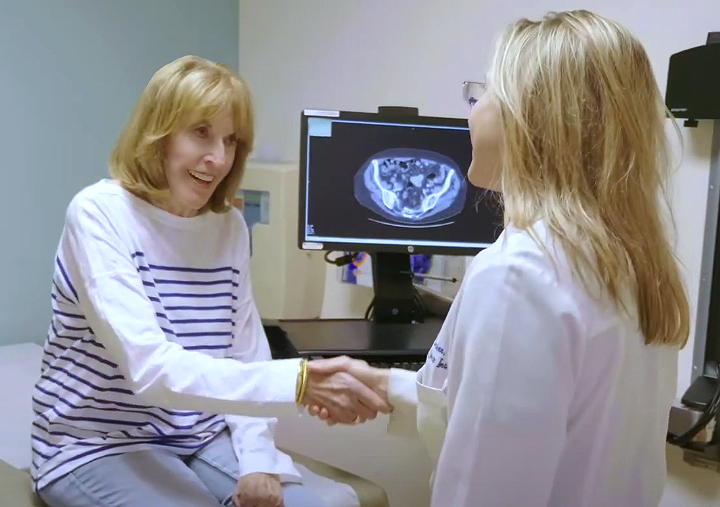 Dr. Jennifer Linehan consults with a urology patient prior to treatment