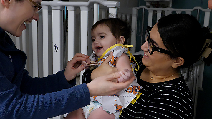 Dr. Courtney Voelker meets with Zara and her parents before surgery - Saint John's Health Center